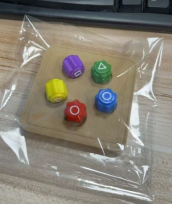 Playing Gonggi squid game