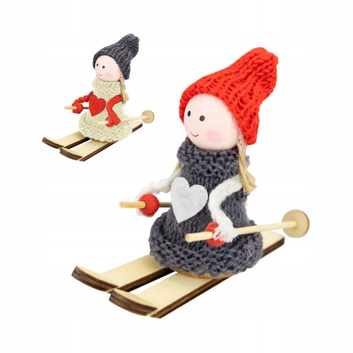Christmas ornament of a girl skiing with poles