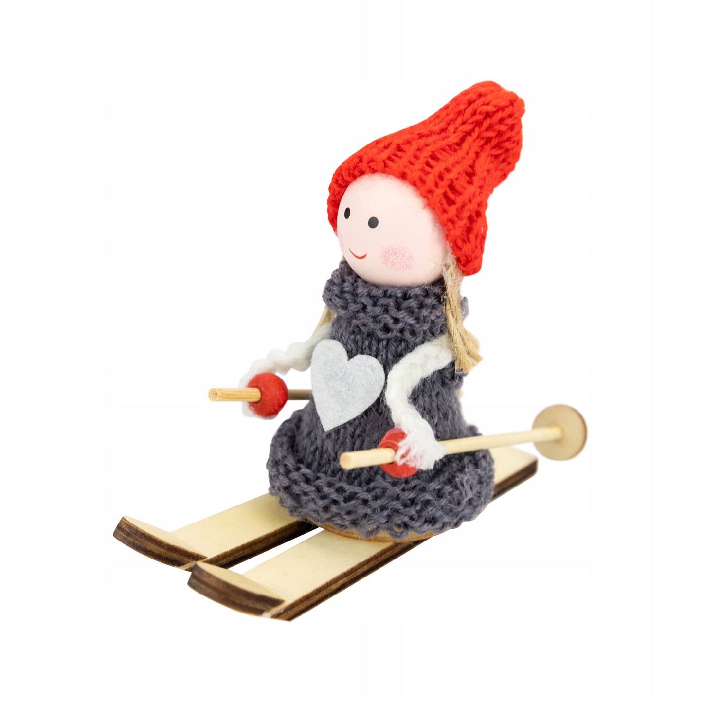 Christmas ornament of a girl skiing with poles